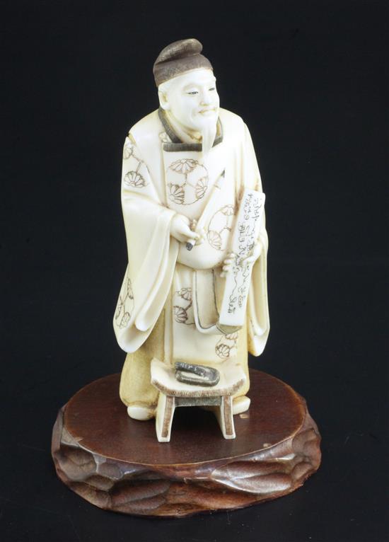 A Japanese ivory figure of a scholar, early 20th century, 11.8cm, wood stand